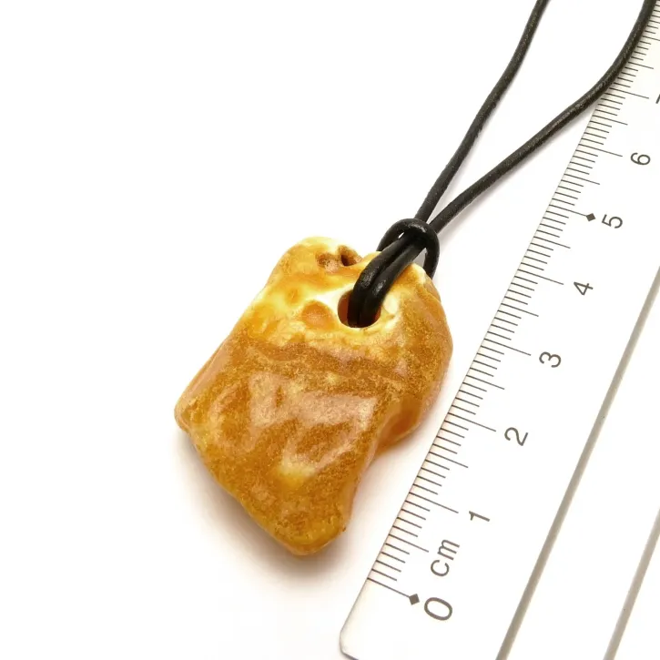 V18-16 Bernstein-Tropfen, milchig